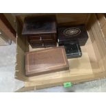 A rosewood tea caddy, two treen boxes and a miniature chest of two drawers