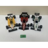 Burago Models. Three 1-24 sale models. A Renault RE30 (Damaged), a Williams FW08 and a Ferrari 126