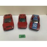 1-24 scale. A Polistil Ferrari 308 GTB, a Burago Ferrari 512 and a Burago Ferrari 308 GTB