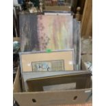 A box of oil, watercolours and prints