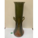 A Linthorpe pottery two handled vase, impressed mark and number 2301. Probably designed by Dr.