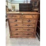 A Victorian Scottish mahogany chest of two short over three long drawers flanked by bobbin turned