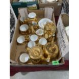 A box of Royal Worcester gilded crockery