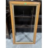 A 19th century birds eye maple picture frame. 26½'h x 45½'w