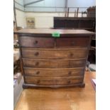 A mahogany miniature bowfronted chest of two short over four long drawers. 18' wide