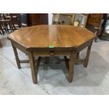 An oak octagonal low table. 43' diam.