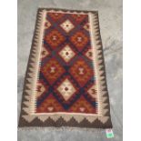 A Maimana Kilim rug. 1.36m x 0.81m