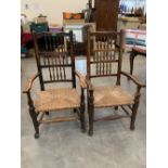 Two 19th century Lancashire spindle back elbow chairs with rush seats