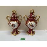 A pair of rococo revival pot-pourri vases and covers, painted with summer flowers in two reserves