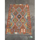 A Choli Kilim rug. 1.2m x 0.8m