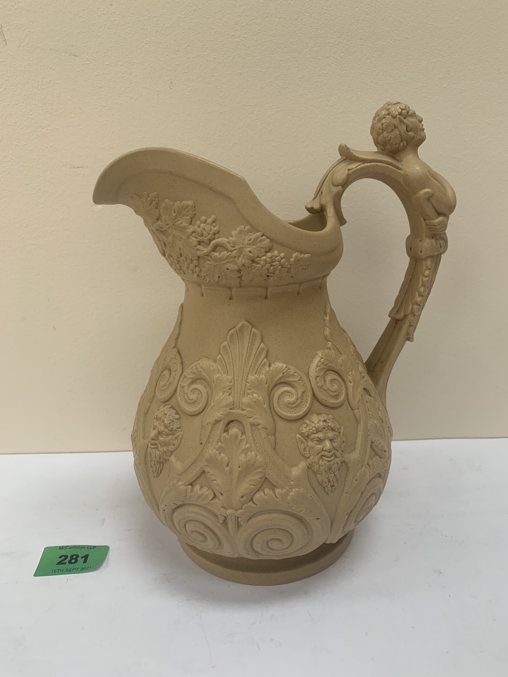 A Ridgway Pipe and Pan pattern jug decorated in relief. c.1838. 8½' high