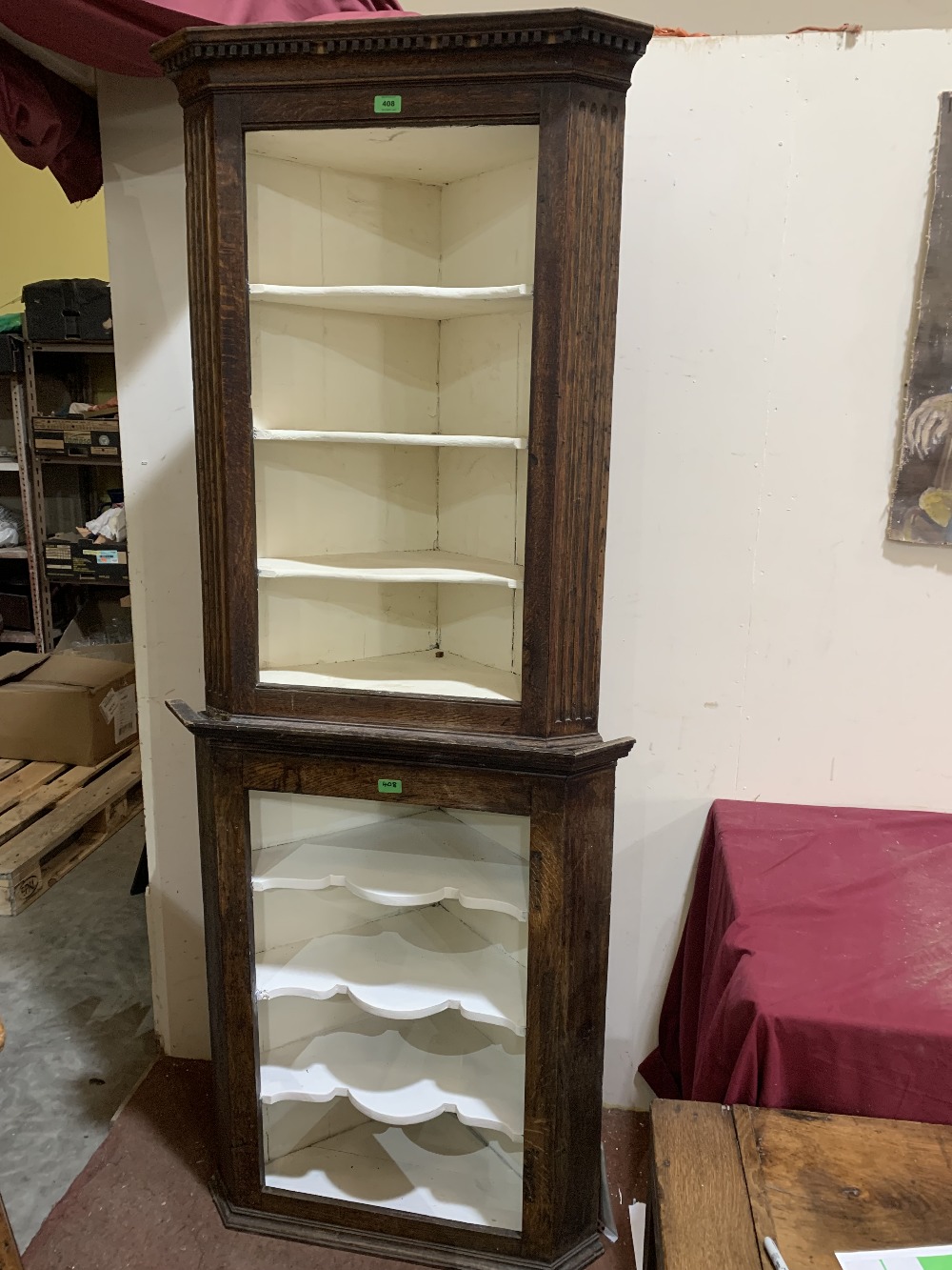 Two oak open corner cupboards