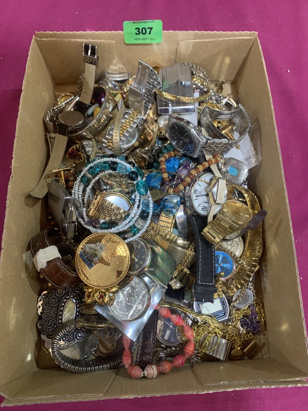 A box of costume jewellery and watches