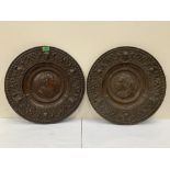 A pair of Victorian embossed metal Lord Byron and Walter Scott wall plaques. 17' diam