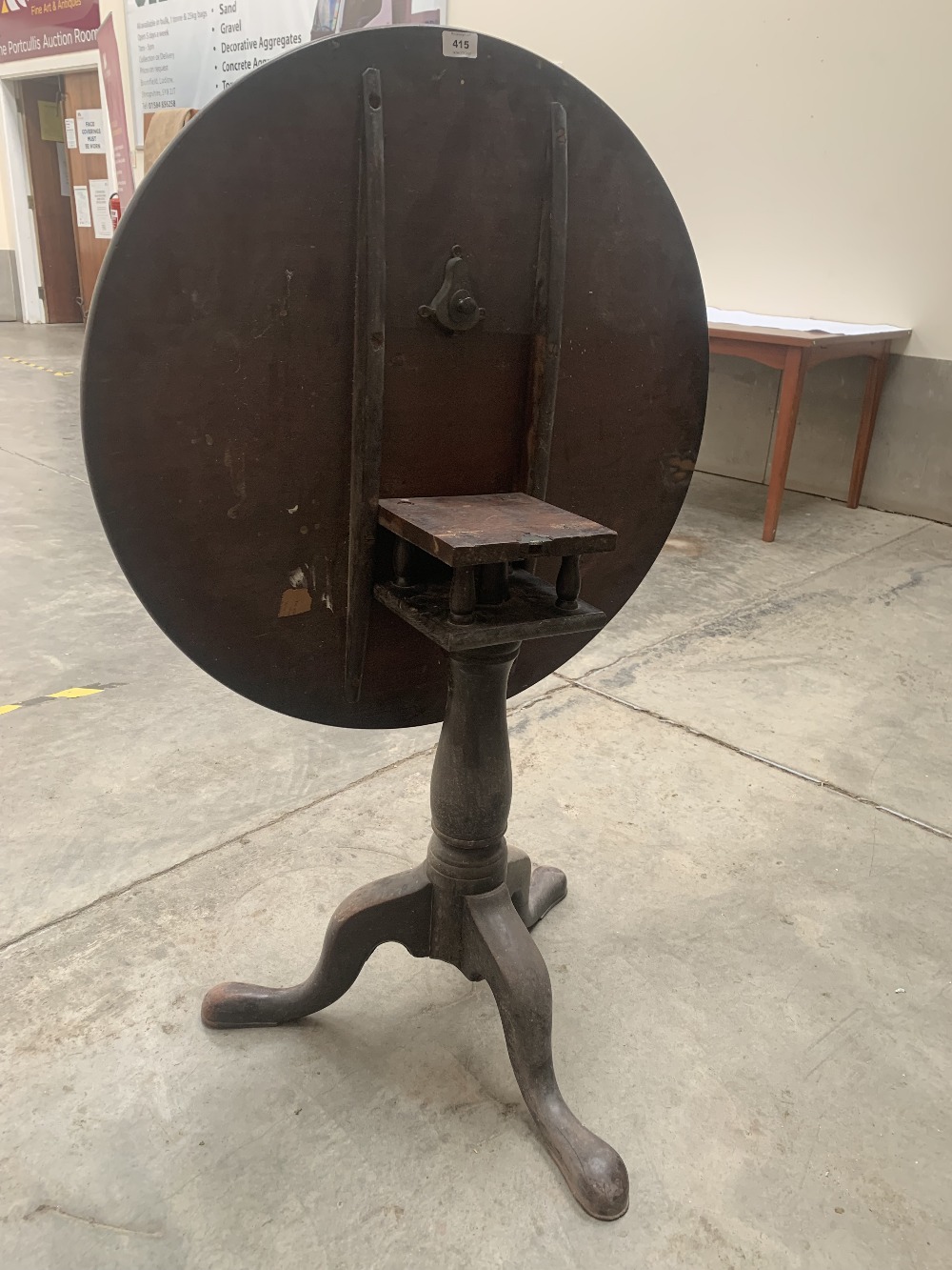 A George III mahogany tripod table, the one piece snap-top on baluster column with birdcage. 30½' - Image 2 of 2