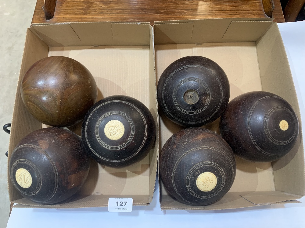 Five lignum bowling woods and one other