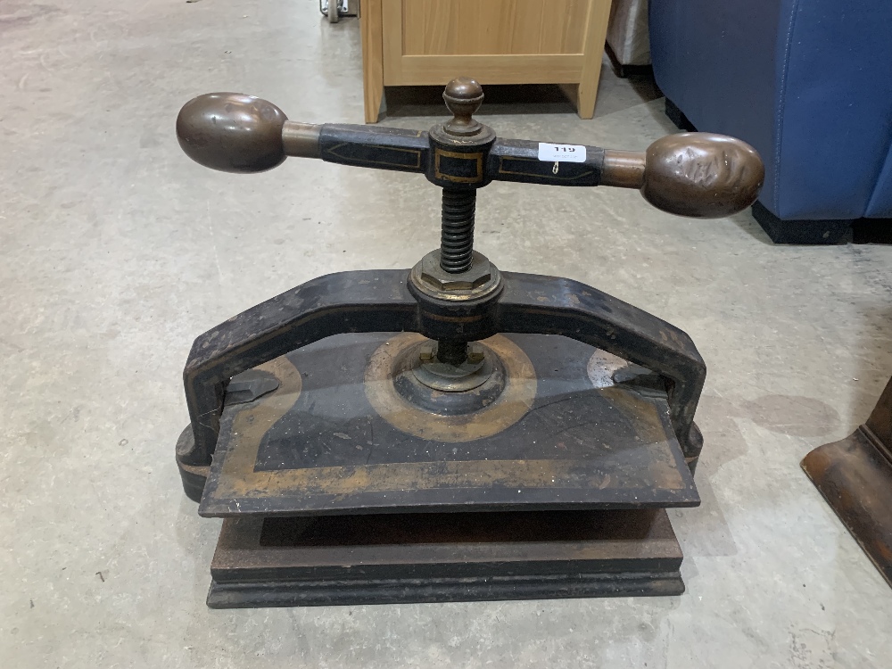 A Victorian iron and gilt decorated book press, the base 19' wide