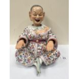 A German nodding pagoda figure. Late 19th century. Modelled as Chinese woman with generous belly,