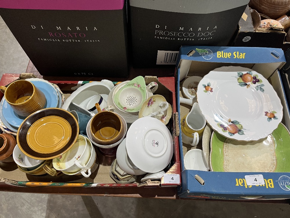 Four boxes of ceramics