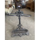 A Victorian cast iron Coalbrookdale style stickstand. 28½' high. Screw on stick support lacking on