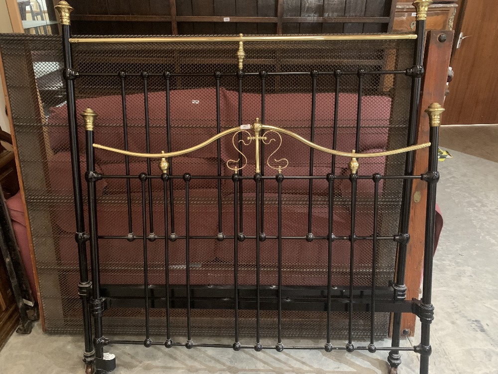 A Victorian 4'6' brass and iron bedstead