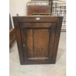 An 18th century oak hanging corner cupboard. 32' high