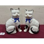 A pair of Staffordshire cats. 8' high