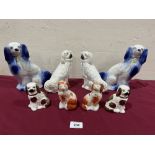 Four pairs of Staffordshire spaniels, the largest 8½' high