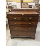 A George III oak and mahogany banded chest of two short over three long drawers on bracket feet. 36'