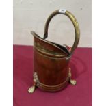 A brass coal bucket