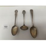 A silver sifting spoon and two silver dessert spoons 2ozs 8dwts