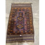 An eastern pile and flat weave rug. 50' x 30'