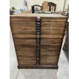 A 19th century pine plans chest in two parts, each part with twelve drawers. 36'w x 38'h. Worm