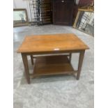 A 1960s handmade teak two tier occasional table. 23¾'w x 16¼'h