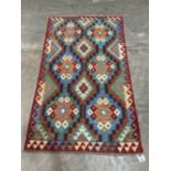 A Choli Kilim rug. 1.6m x 1.0m