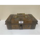 A 19th century toleware moneybox