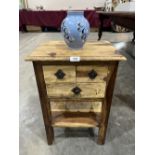 An eastern hardwood three drawer bedside chest together with a Pearsons incised globular vase