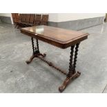 A Victorian rosewood centre table, the moulded top on double column barleytwist turned end