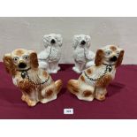 Two pairs of Staffordshire spaniels, the larger pair 10' high