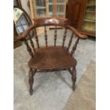 A 19th century smoker's bow elbow chair