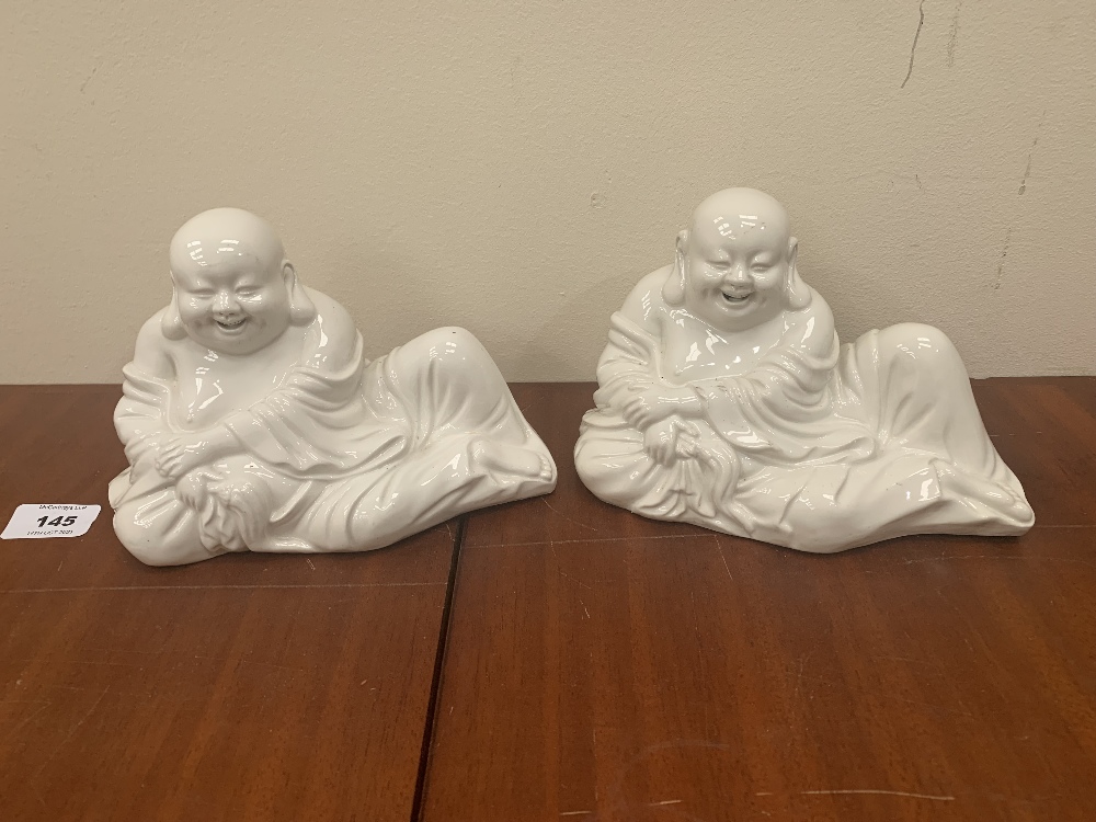A pair of Chinese blanc-de-chine buddhas. 8' wide