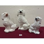 Three 19th century Staffordshire spaniels, 10' - 15' high