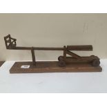 An oak scratch-built model of the Leominster ducking stool. 16½' long