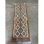 A Choli Kilim carpet runner. 1.9m x 0.62m