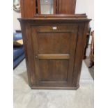 An early 19th century joined oak hanging corner cupboard. 39' high