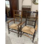 Two 19th century Lancashire spindle back elbow chairs with rush seats