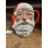 A Royal Doulton character jug. Santa Claus D6704, 7½' high