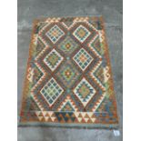 A Choli Kilim rug. 1.45m x 0.99m