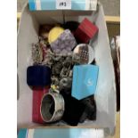 A box of costume and silver jewellery