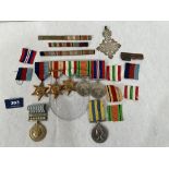 A World War II group of five medals, two Korea medals (one marked L/FX. 575836 W.G. PARKER. L.E.M.